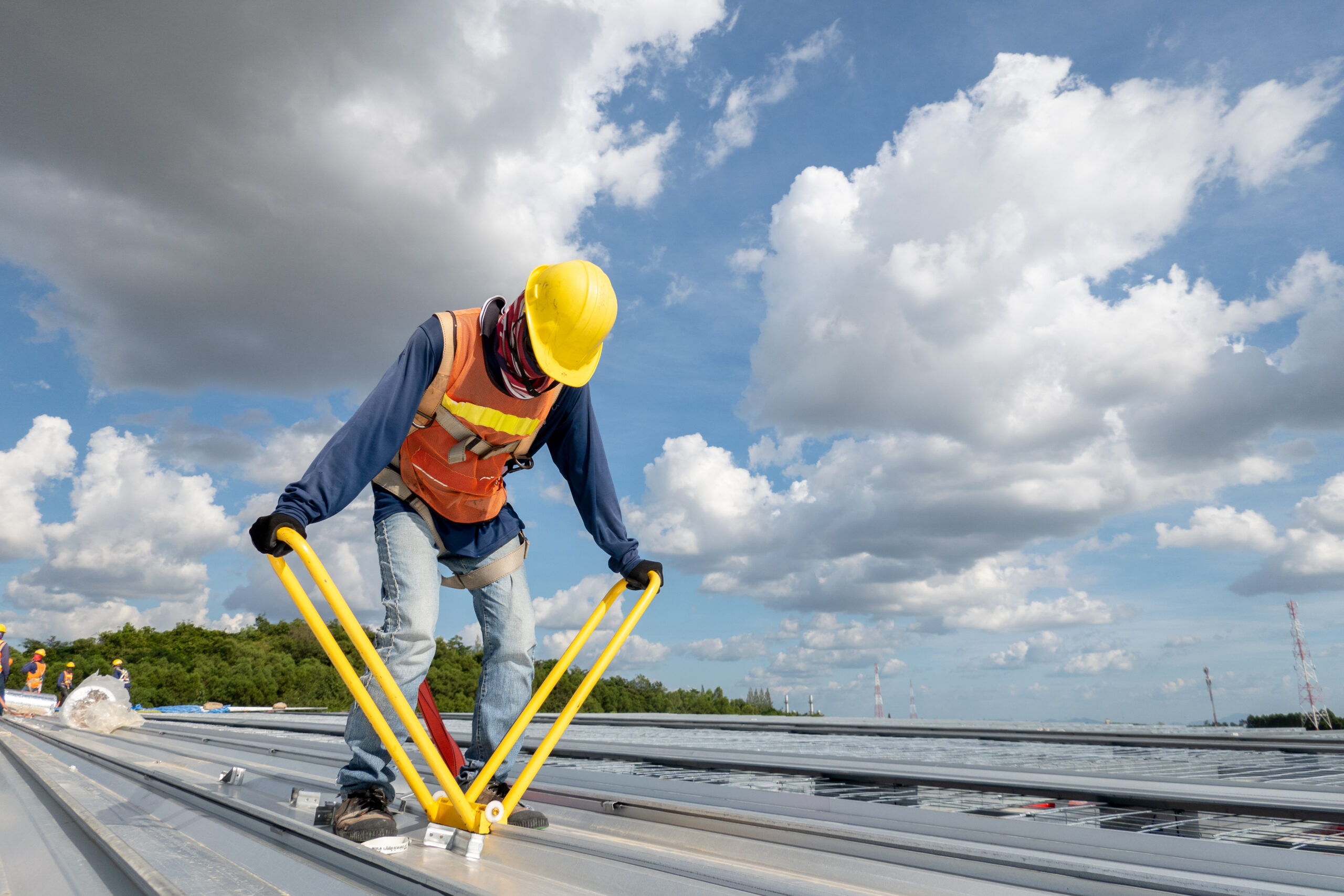 construction worker on a metal deck platform