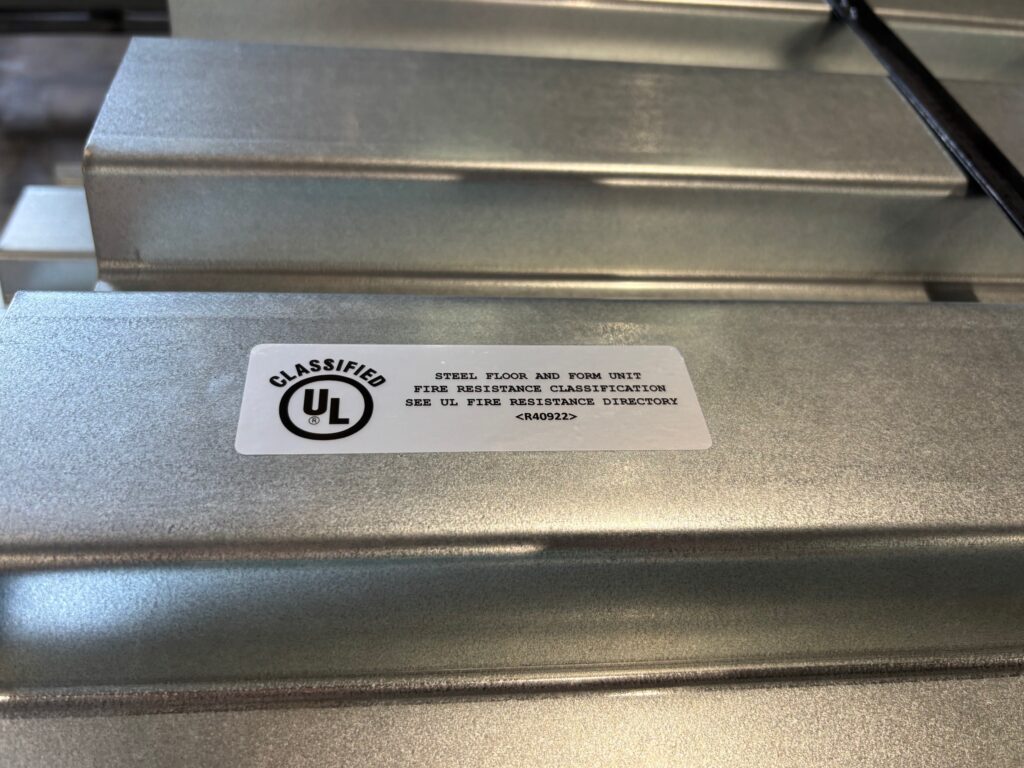 metal deck with UL sticker on. reads: Steel floor and form unit fire resistance classification see UL fire resistance directory <R40922>